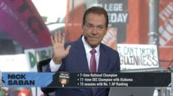 Nick Saban waves to the crowd during his first appearance as a College GameDay analyst on ESPN.
